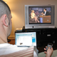 Robert Horton spends a quiet night at home with his favorite entertainment rectangles.